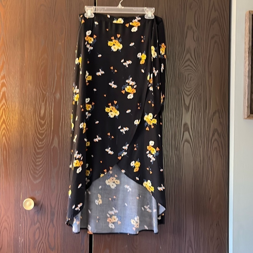 H&M black with floral patter wraparound long skirt. Size 8